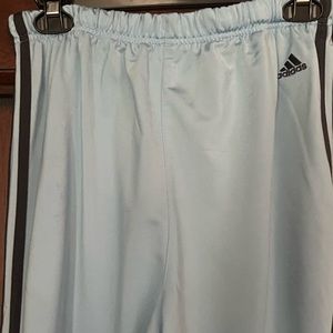 Adidas light blue pants with dark blue stripes. Size M